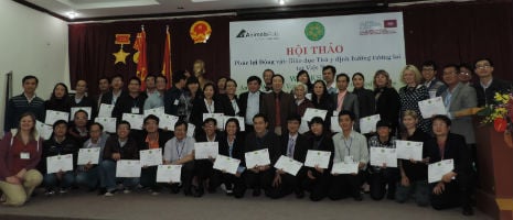 workshop participants pose with their certificates