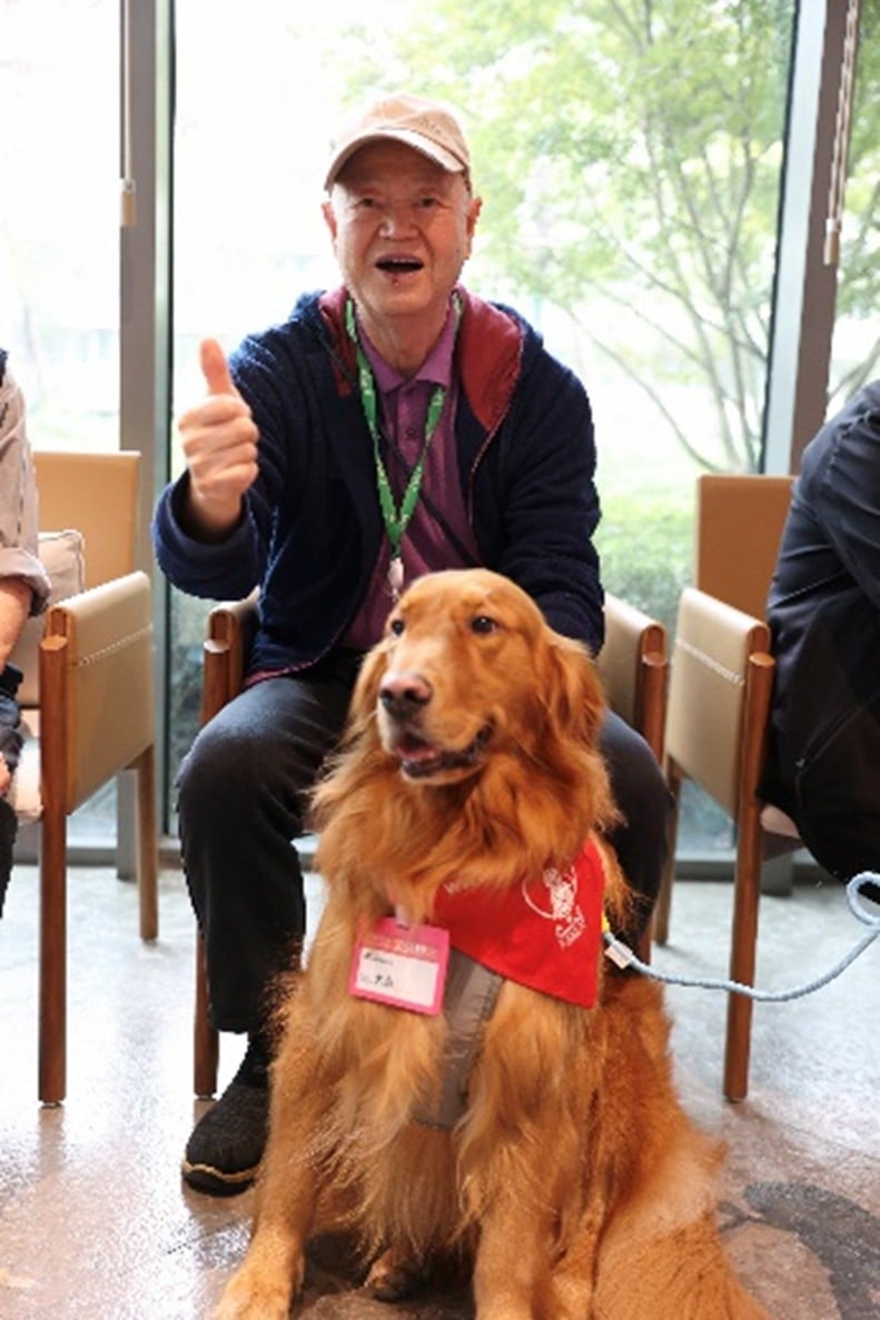 elderly man with dog